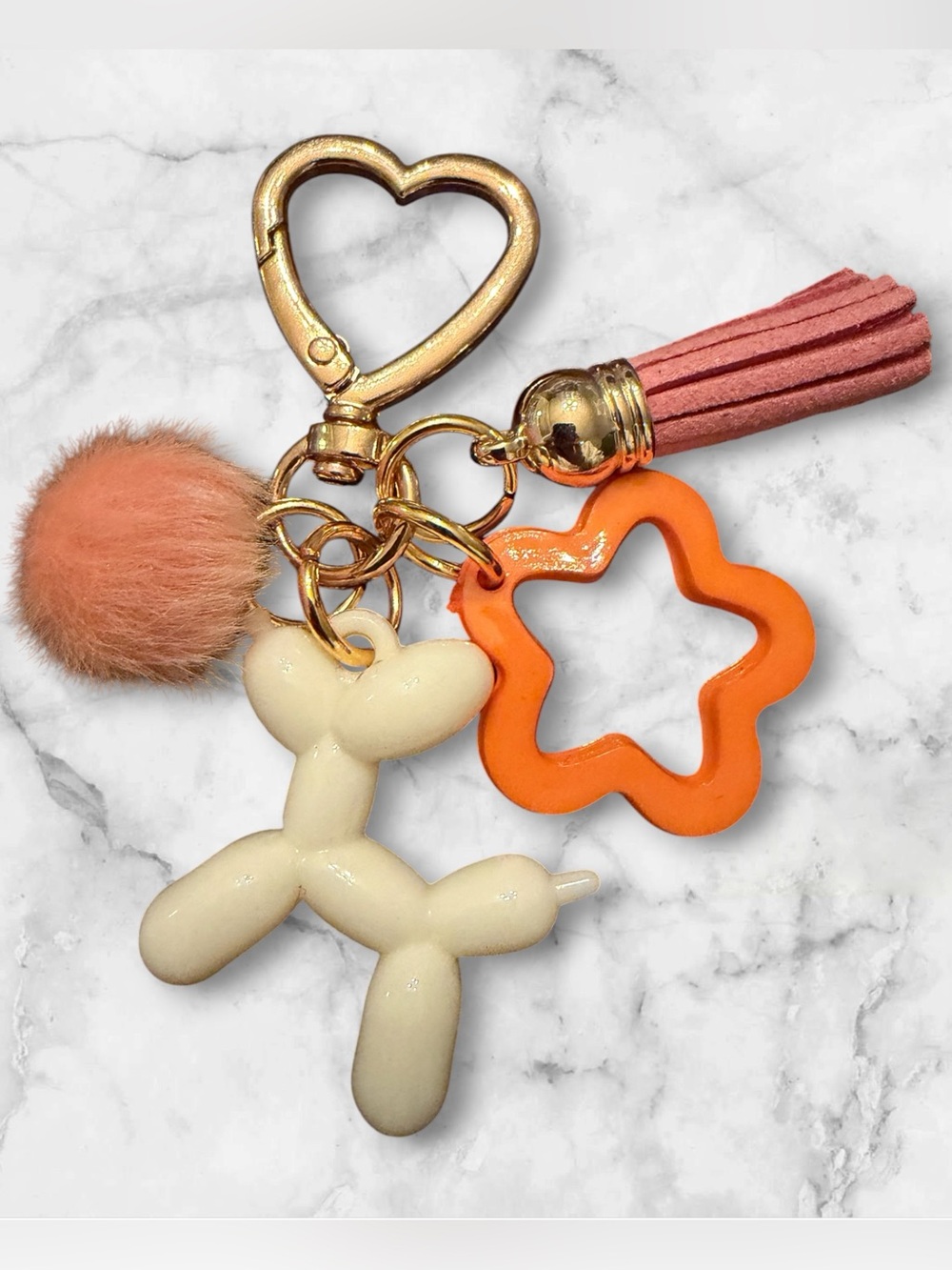 Gold Heart Keyring with Cream Balloon Dog & Orange Star Charm